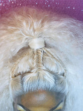 Load image into Gallery viewer, Close up view of the micro fishtail braid details on the Platinum High Pony Floof. The High Pony Floof is a big and airy lace front wig made with crimped texture and featuring micro fishtail braid details that lead into a super high ponytail.