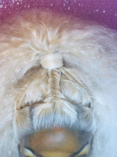 Load image into Gallery viewer, Close up view of the micro fishtail braid details on the Platinum High Pony Floof. The High Pony Floof is a big and airy lace front wig made with crimped texture and featuring micro fishtail braid details that lead into a super high ponytail.
